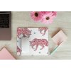 mousepad mockup over a wooden surface by some flowers and a laptop 27560