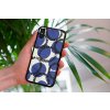 mockup of a woman holding a clear phone case in front of a houseplant 4636 el1 (21)