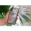 mockup of a woman holding a clear phone case in front of a houseplant 4636 el1 2022 04 20T132317.178