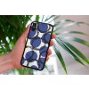 mockup of a woman holding a clear phone case in front of a houseplant 4636 el1 (21)