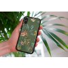 mockup of a woman holding a clear phone case in front of a houseplant 4636 el1 (31)
