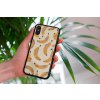mockup of a woman holding a clear phone case in front of a houseplant 4636 el1 2022 04 20T101740.338