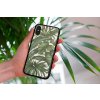 mockup of a woman holding a clear phone case in front of a houseplant 4636 el1 (23)