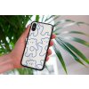 mockup of a woman holding a clear phone case in front of a houseplant 4636 el1 2022 04 27T132521.652