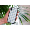 mockup of a woman holding a clear phone case in front of a houseplant 4636 el1 2022 04 27T132236.816