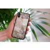 mockup of a woman holding a clear phone case in front of a houseplant 4636 el1 2022 05 18T140059.546