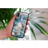 mockup of a woman holding a clear phone case in front of a houseplant 4636 el1 2022 05 18T135637.429