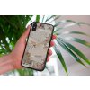 mockup of a woman holding a clear phone case in front of a houseplant 4636 el1 2022 05 18T140901.277