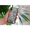 mockup of a woman holding a clear phone case in front of a houseplant 4636 el1 2022 05 23T142752.535