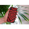 mockup of a woman holding a clear phone case in front of a houseplant 4636 el1 2022 05 24T141706.850