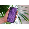 mockup of a woman holding a clear phone case in front of a houseplant 4636 el1 2022 04 26T123233.178