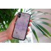 mockup of a woman holding a clear phone case in front of a houseplant 4636 el1 2022 04 27T133045.981