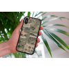 mockup of a woman holding a clear phone case in front of a houseplant 4636 el1 2022 05 18T133111.727