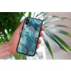 mockup of a woman holding a clear phone case in front of a houseplant 4636 el1 2022 04 26T134925.943