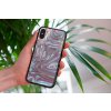 mockup of a woman holding a clear phone case in front of a houseplant 4636 el1 2022 04 26T124127.658