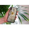 mockup of a woman holding a clear phone case in front of a houseplant 4636 el1 2022 05 23T145253.544