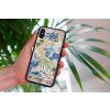 mockup of a woman holding a clear phone case in front of a houseplant 4636 el1 2022 05 23T142324.199