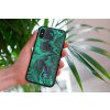 mockup of a woman holding a clear phone case in front of a houseplant 4636 el1 2022 04 26T133948.281