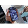mockup of a man holding a clear phone case 4638 el1 2022 04 26T134257.364