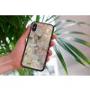 mockup of a woman holding a clear phone case in front of a houseplant 4636 el1 2022 05 04T141237.476
