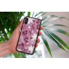 mockup of a woman holding a clear phone case in front of a houseplant 4636 el1 2022 05 04T133434.088