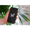 mockup of a woman holding a clear phone case in front of a houseplant 4636 el1 2022 04 27T082758.162