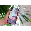mockup of a woman holding a clear phone case in front of a houseplant 4636 el1 (11)