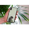 mockup of a woman holding a clear phone case in front of a houseplant 4636 el1 (18)