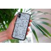 mockup of a woman holding a clear phone case in front of a houseplant 4636 el1 2022 06 02T140343.771
