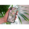 mockup of a woman holding a clear phone case in front of a houseplant 4636 el1 2022 06 02T134842.111