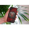 mockup of a woman holding a clear phone case in front of a houseplant 4636 el1 (50)