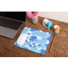 mockup of a mousepad lying on a rustic table next to a flower vase 27554 (10)