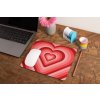 mockup of a mousepad lying on a rustic table next to a flower vase 27554 (13)