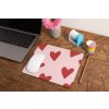 mockup of a mousepad lying on a rustic table next to a flower vase 27554 (23)