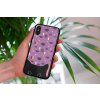 mockup of a woman holding a clear phone case in front of a houseplant 4636 el1 (3)