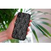 mockup of a woman holding a clear phone case in front of a houseplant 4636 el1 (5)