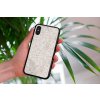 mockup of a woman holding a clear phone case in front of a houseplant 4636 el1 (36)
