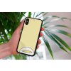 mockup of a woman holding a clear phone case in front of a houseplant 4636 el1 (40)