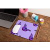mockup of a mousepad lying on a rustic table next to a flower vase 27554 (5)