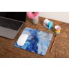 mockup of a mousepad lying on a rustic table next to a flower vase 27554 (7)
