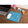 mockup of a mousepad lying on a rustic table next to a flower vase 27554 (13)