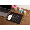 mockup of a mousepad lying on a rustic table next to a flower vase 27554 (23)