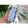 mockup of a woman holding a clear phone case in front of a houseplant 4636 el1 (7)