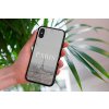 mockup of a woman holding a clear phone case in front of a houseplant 4636 el1 (3)