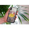 mockup of a woman holding a clear phone case in front of a houseplant 4636 el1