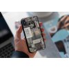 mockup of a man holding a clear phone case 4638 el1