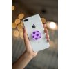 phone grip mockup with string lights in the background 22146