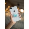 phone grip mockup with string lights in the background 22146