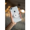phone grip mockup with string lights in the background 22146