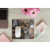 mousepad mockup over a wooden surface by some flowers and a laptop 27560